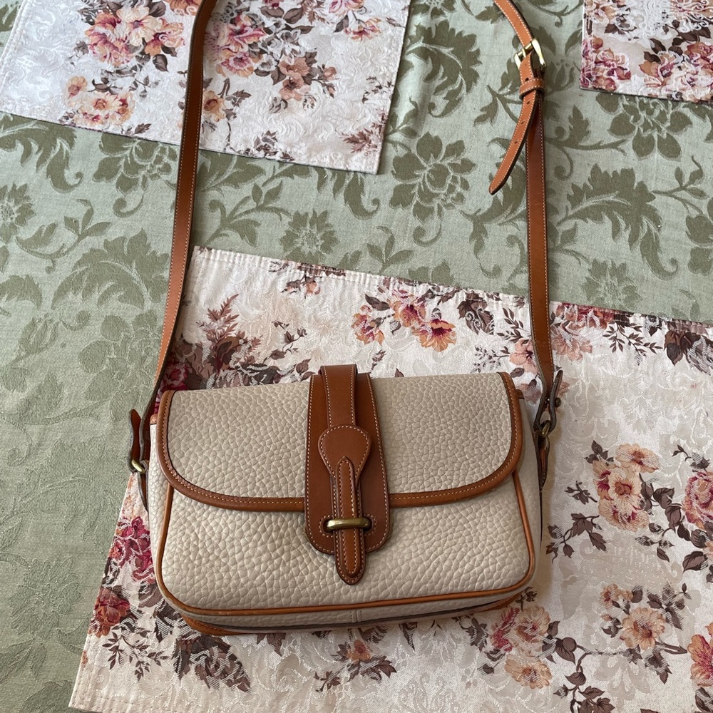 Dooney and Bourke designer handbag gently used willing to negotiate!